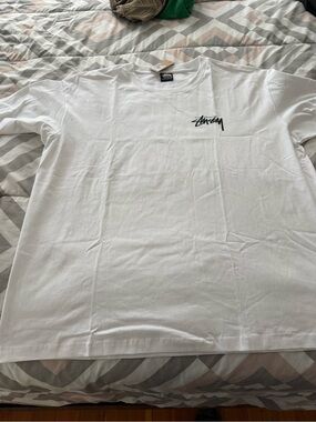 Stussy White Short Sleeve Tee with Black Script Logo